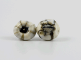 360 degree detail view of mini barnacle earring with stainless steel ear stud.