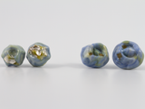 Selection of two barnacle earring studs in a blue-green glass reminiscent of a mermaid's tail. Two styles available.