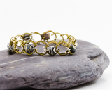 BRL008 (restless)traveller bracelet flameworked glass handformed brass