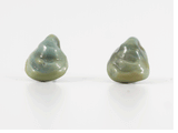 360 degree detail of glass ear studs on stainless steel ear posts in sea green.