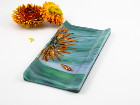 flameworked and fused glass catch-all dish with sunflower design.