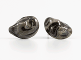 360 degree view of mussel shaped flameworked glass earring studs inspired by the colour of black sea salt.