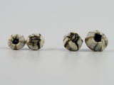 Selection of two painted barnacle earring stud, in two sizes.