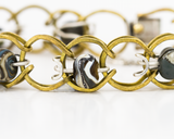 BRL008 (restless)traveller bracelet close up flameworked glass bead detail
